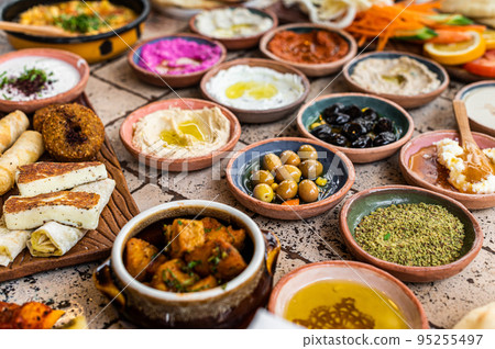 Turkish Village breakfast table served in a restaurant. Top view Turkish Village breakfast table served in a restaurant. Top view 95255497