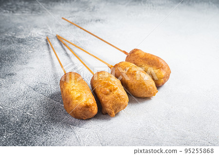 Homemade deep fried corn dogs. White background. Top view 95255868