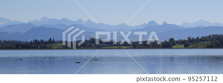 Lake Pfaeffikon and mountain ranges seen from Pfaeffikon, Switzerland. 95257112