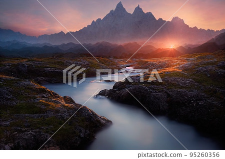 Beautiful ancient mountains at dawn, in the morning sunlight and in the fog. 3D rendering. 95260356