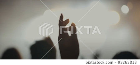 Blurry background picture of hand reaching out for God's help, good for your multimedia content background 95265818