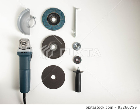 A set of angle grinders disassembled before starting work. Cutting, offset and petal circle. A set of angle grinders disassembled before starting work. Cutting, offset and petal circle. 95266759