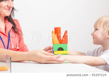 Little caucasian girl 3-4 years old at the appointment with a pediatrician. Varieties of children's doctors, children's medicine Little caucasian girl 3-4 years old at the appointment with a pediatrician. Varieties of children's doctors, children's medicine 95267224