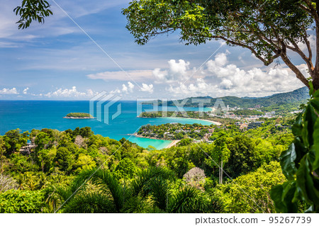Landscape Beautiful turquoise ocean waves with boats and coastline from high view point. Kata and Karon beach Phuket Thailand Landscape Beautiful turquoise ocean waves with boats and coastline from high view point. Kata and Karon beach Phuket Thailand 95267739