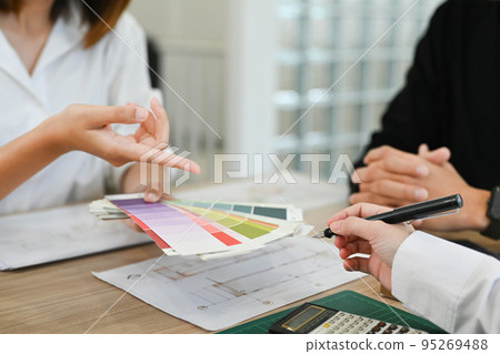 Cropped shot of interior designer team selecting colors for building and planning construction project together at office Cropped shot of interior designer team selecting colors for building and planning construction project together at office 95269488