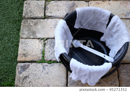 rags drying in the garden 95271352