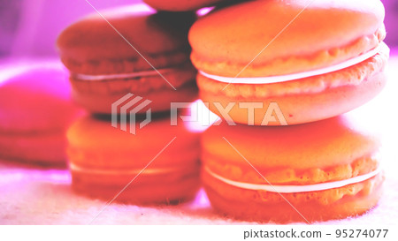 Close-up colorful macaroon with color background, Macaron Candy cookies in background. 95274077