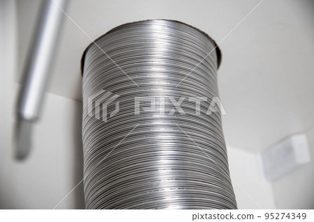 Aluminum corrugation from a kitchen hood. Purification and air supply. Close-up 95274349