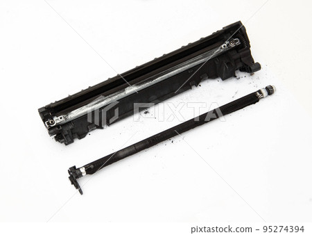 Disassembly of a drum cartridge on a white background. Cleaning and maintaining cartridge parts. Copy space for text 95274394