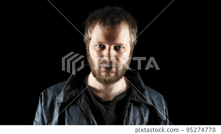 Tramp in dirty clothes, male refugee. Below poverty line concept. Consequences of drunkenness, alcoholism. Closeup portrait of bearded homeless on dark background. Fugitive beggar. Illegal immigrant Tramp in dirty clothes, male refugee. Below poverty line concept. Consequences of drunkenness, alcoholism. Closeup portrait of bearded homeless on dark background. Fugitive beggar. Illegal immigrant 95274778