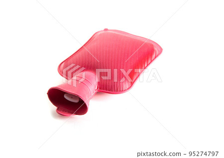 Red medical heating pad with hot water on a white background, isolate. Close-up, object 95274797