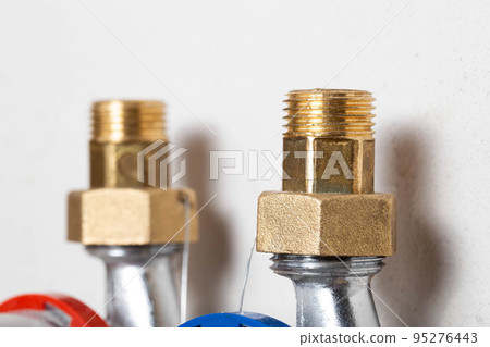 Threaded fitting, the connecting part of the pipeline in the water supply. Transition from smaller to larger diameter, close-up Threaded fitting, the connecting part of the pipeline in the water supply. Transition from smaller to larger diameter, close-up 95276443