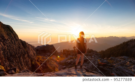 Adventurous Woman Hiker on top of Canadian Mountain Landscape. 95277889