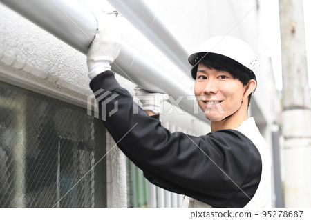 young worker man at work young worker man at work 95278687