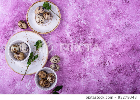 Bowl with quail eggs on light background Bowl with quail eggs on light background 95279348