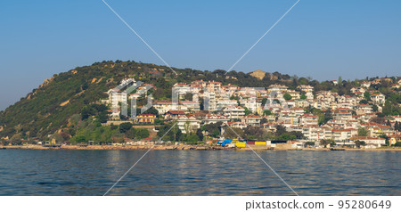View of Kinaliada island from the sea with summer houses from the Sea of Marmara near Istanbul, Turkey 95280649