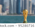 FIFA World Cup Trophy on the Doha corniche, Qatar. 95280716