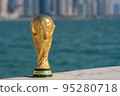 FIFA World Cup Trophy on the Doha corniche, Qatar. 95280718