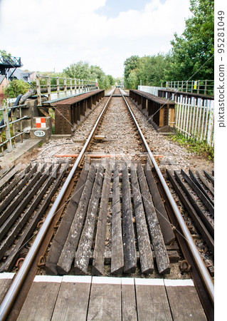 A single track through the town of Rye on the outskirts of London A single track through the town of Rye on the outskirts of London 95281049