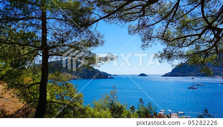 Icmeler Beach view in Marmaris Town. Summer landscape on the Mediterranean coast in Turkey. 95282226