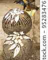 Dried fish on the basket  95283476
