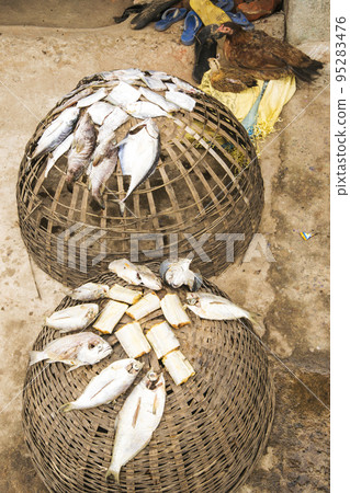 Dried fish on the basket  95283476