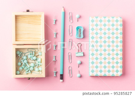 School stationery in turquoise color, flat lay. Back to school 95285827