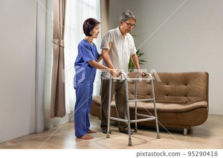 Caregiver takecare older man that having Sarcopenia or muscle loss. Sarcopenia is a degenerative disease of the muscle usually caused by the natural consequence of aging. 95290418