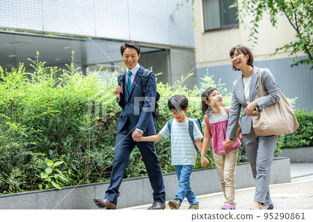 Elementary school students and families going to work 95290861