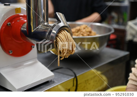 Miso ingredients coming out of the mincing machine 95291030