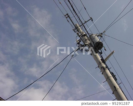 Utility poles and blue sky 95291287