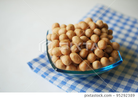 indonesia peanuts in a bowl on table top down . indonesia peanuts in a bowl on table top down . 95292389
