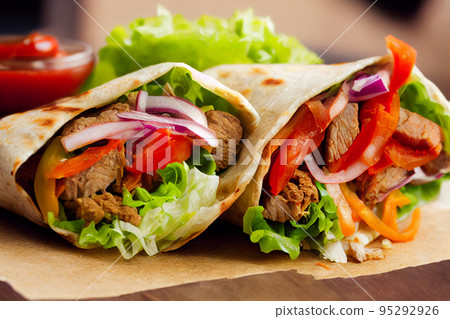 Photo realistic illustration of kebab wrap with spicy meat and salad. 95292926