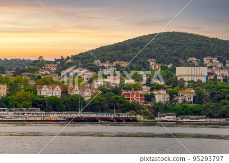 View of the hills of Kinaliada island from Marmara Sea, with traditional summer houses, Istanbul, Turkey 95293797