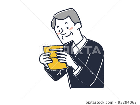 An elderly man smiling at the savings accumulated in his passbook 95294062