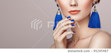 Beautiful Woman with Large Earrings Tassels Beautiful Woman with Large Earrings Tassels 95295467
