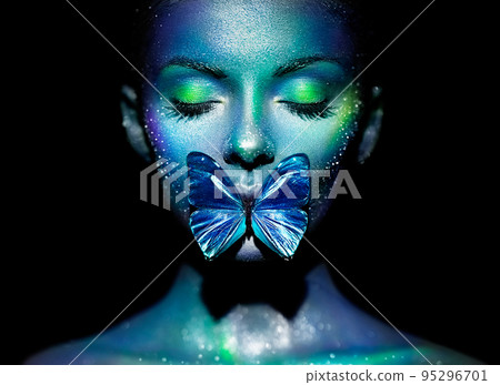 Beauty model woman with violet butterfly Beauty model woman with violet butterfly 95296701