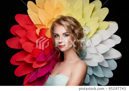 Beautiful woman on the background of a large flower 95297743