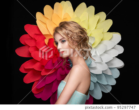 Beautiful woman on the background of a large flower Beautiful woman on the background of a large flower 95297747