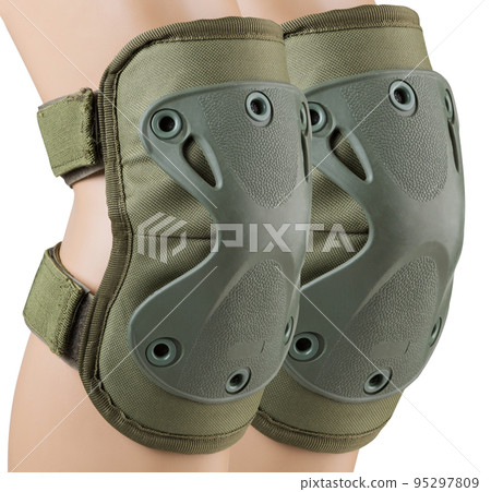 Army tactical knee pads on the legs, khaki color, close-up, on a white background, isolate 95297809