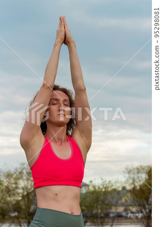Yoga in the park serenity and relaxation Yoga in the park serenity and relaxation 95298081