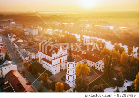 Pinsk, Brest Region, Belarus. Bird's-eye View Of Cathedral Of Name Of The Blessed Virgin Mary And Monastery Of The Greyfriars. Famous Historic Landmarks. Cityscape Skyline In Autumn Morning Pinsk, Brest Region, Belarus. Bird's-eye View Of Cathedral Of Name Of The Blessed Virgin Mary And Monastery Of The Greyfriars. Famous Historic Landmarks. Cityscape Skyline In Autumn Morning 95298489