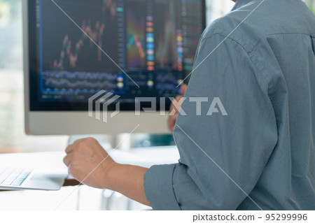 man trading stocks at home man trading stocks at home 95299996