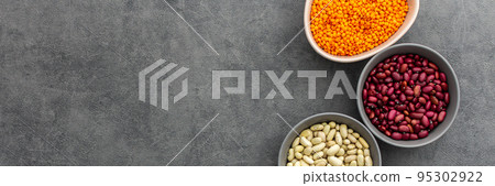 Different types of legumes in bowls 95302922