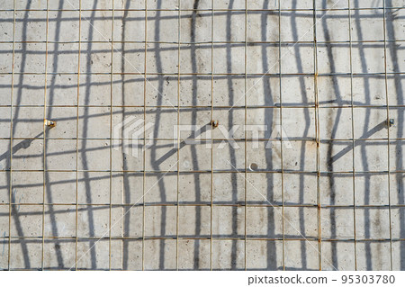 old metal grille with rust isolated on a natural wall background. 95303780
