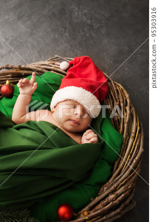 newborn Santa is sleeping in a wreath newborn Santa is sleeping in a wreath 95303916