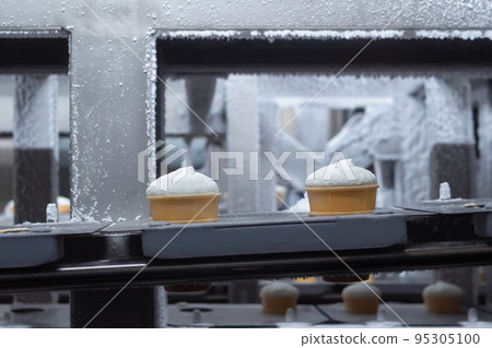 Conveyor belt with ice cream cones - production line on dairy factory 95305100