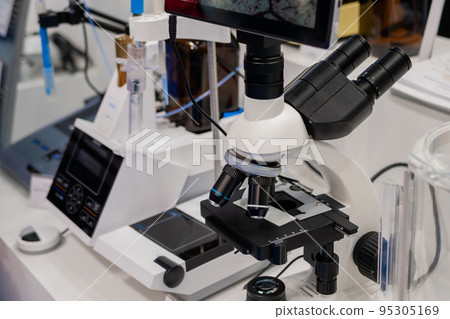 Professional medical microscope in science lab, exhibition 95305169