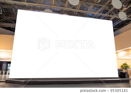 Woman looking at blank large interactive wall display - mock up concept Woman looking at blank large interactive wall display - mock up concept 95305181