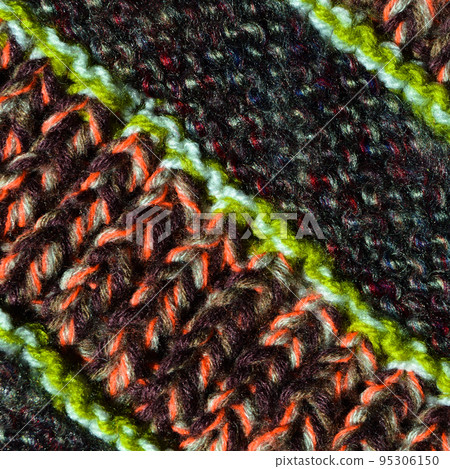 Handmade knitted fabric colored wool background texture Handmade knitted fabric colored wool background texture 95306150